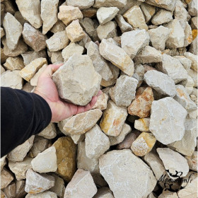 Roche Jura grès calcaire 80/150 mm tenue en main face de cassure beige MonBassin